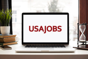 computer screen with the USA jobs logo and a button saying 'Apply Today'